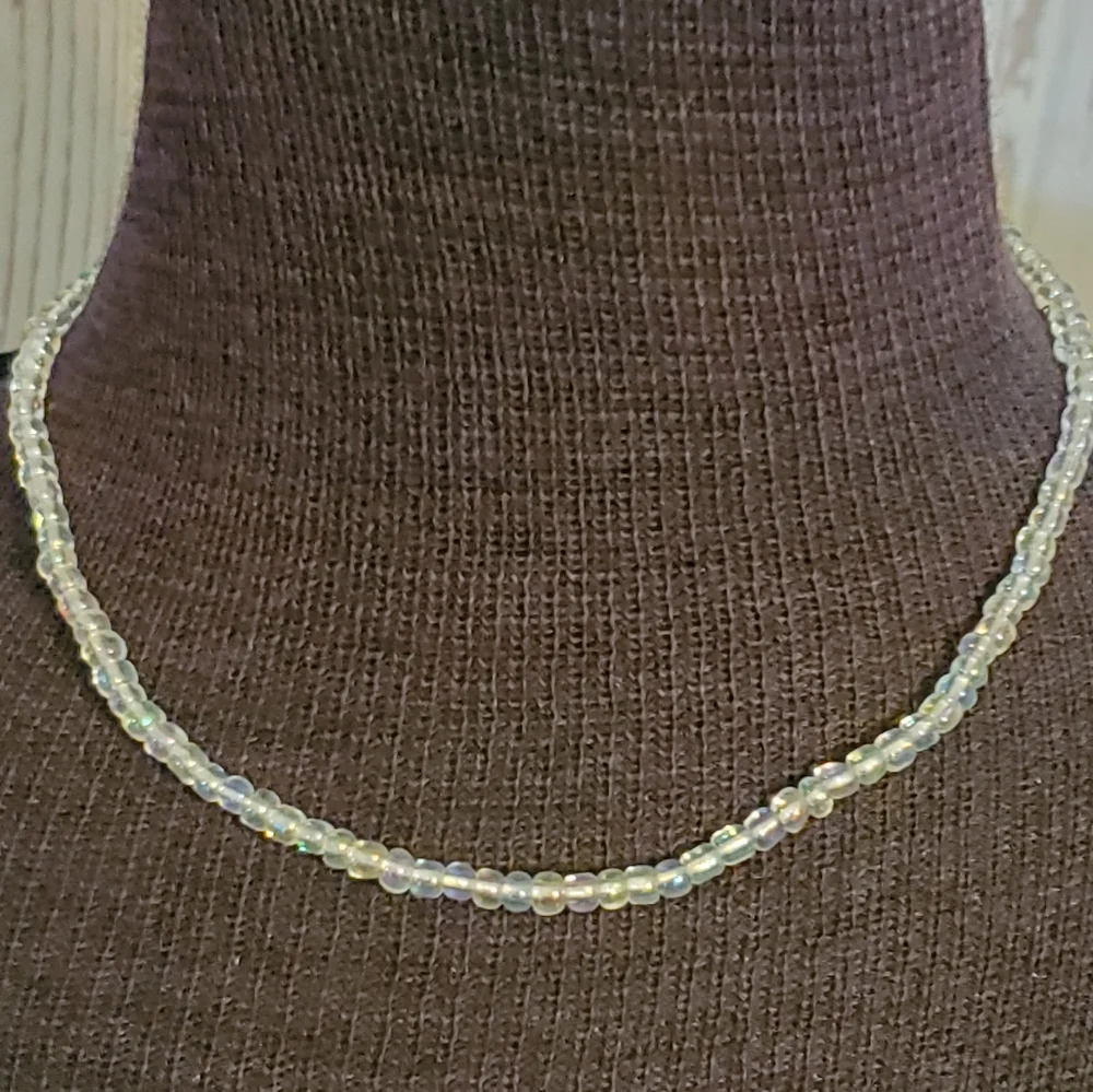 Clear iridescent beaded stretch necklace 14 inches long unstretched
